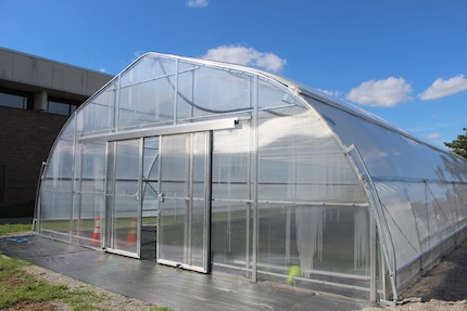 New Greenhouses Make South Lansing Community Garden A Year Round Operation